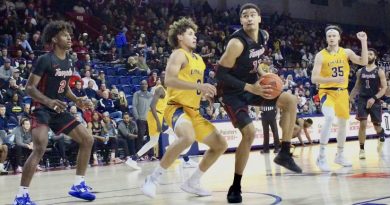Nick Jourdain takes a hop step under the basket against La Salle at the Palestra.