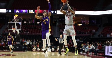 Khalif Battle hits a contested three over an outstretched defender.