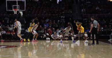 Temple tries to make a defensive stop against Wichita State.