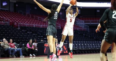 Tiarra East knocks down a jumper over a defender.
