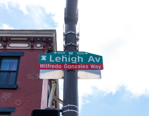 Street sign for Lehigh Avenue photographed against blue sky