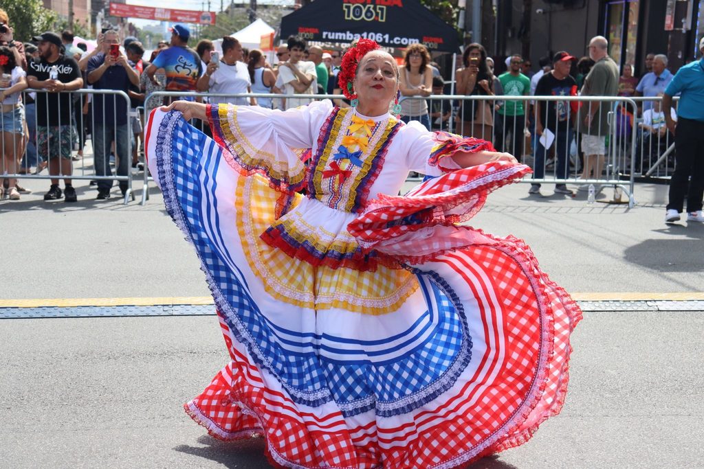 Traditional Columbian folklore dancer dances in front of audience